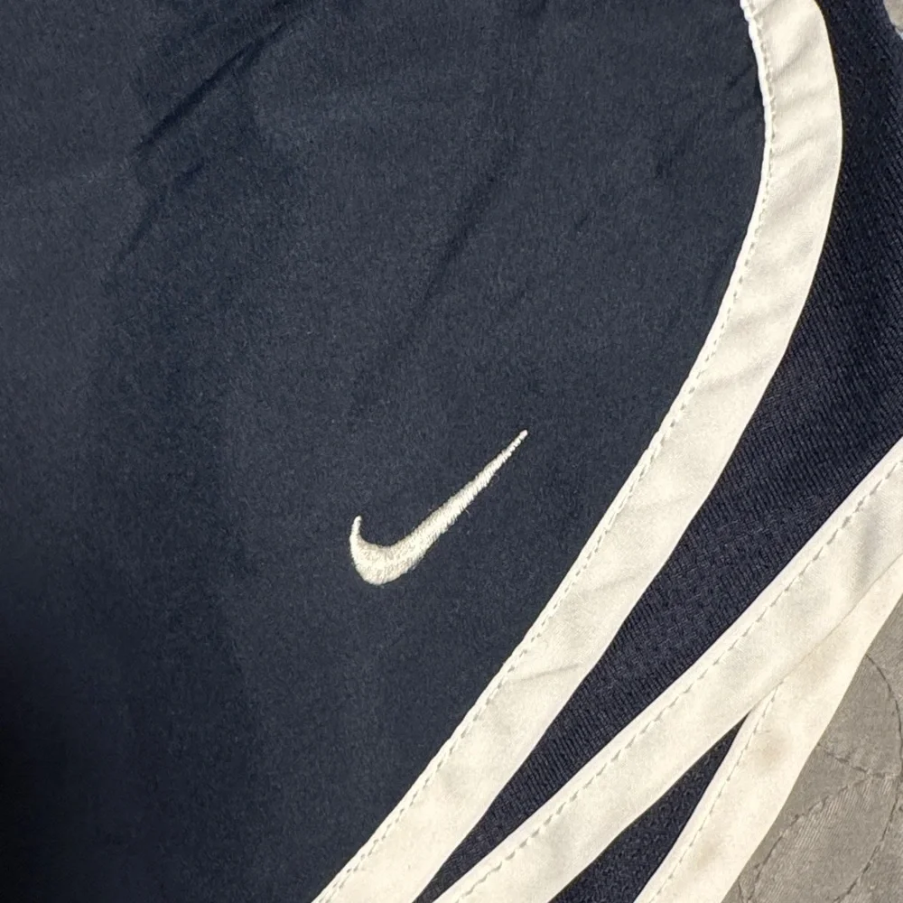 Nike Women's Dark Blue Athletic Shorts with Light Trim
